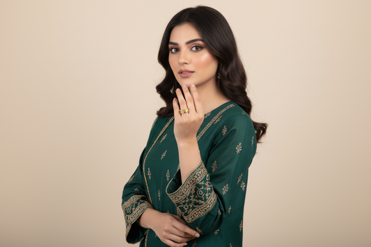 Pakistani model wearing floral ring with party dress