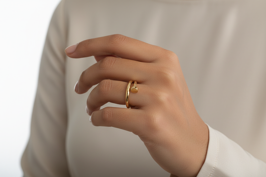 Pakistani model wearing gold nail ring - version 2